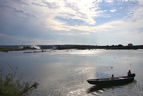 Boat on the Zambezi River above Victoria Falls - Zambia, Zimbabwe border, Africa